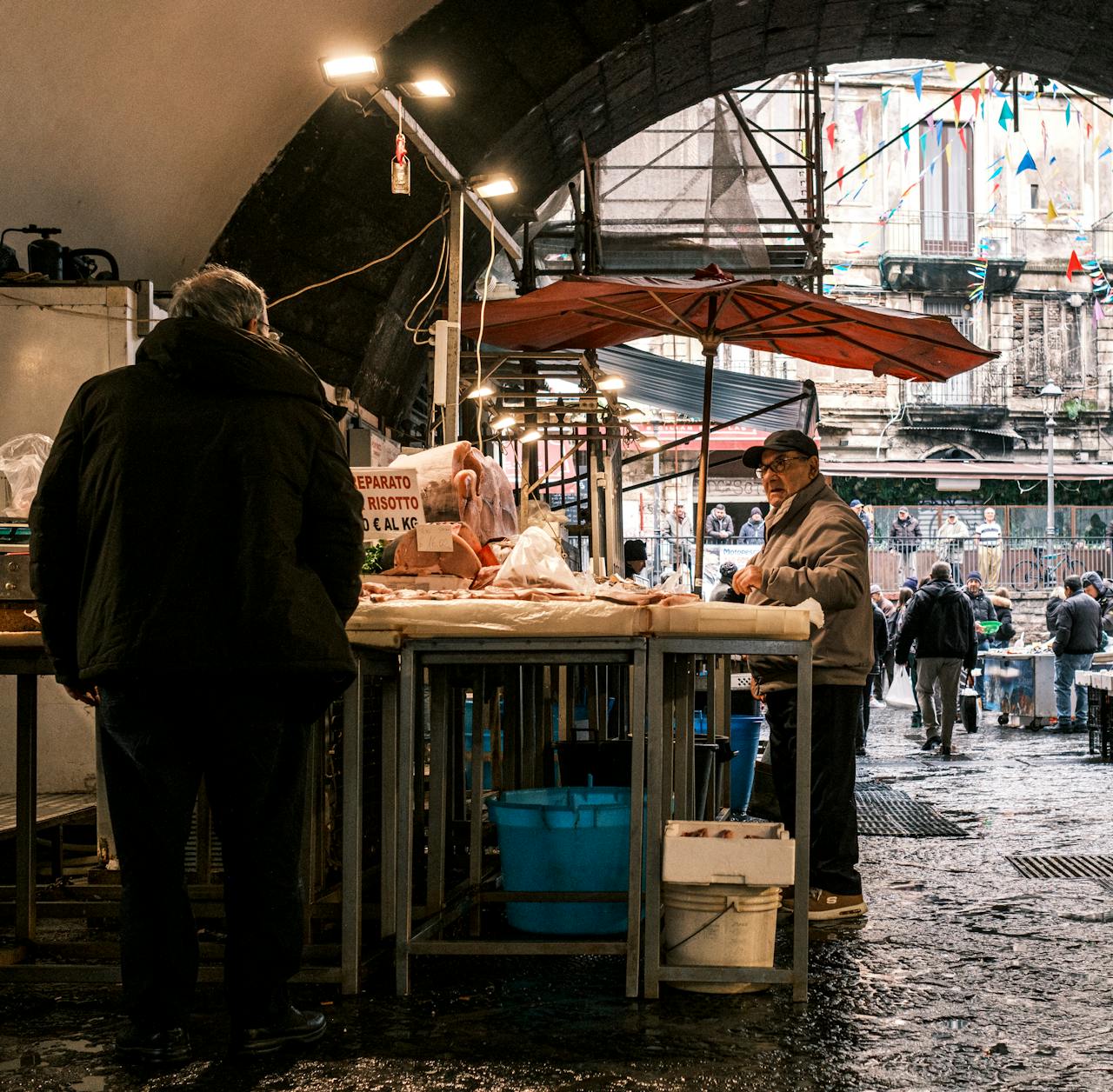About Explore the vibrant atmosphere of a bustling fish market in Catania, Sicily, showcasing local vendors and fresh produce.