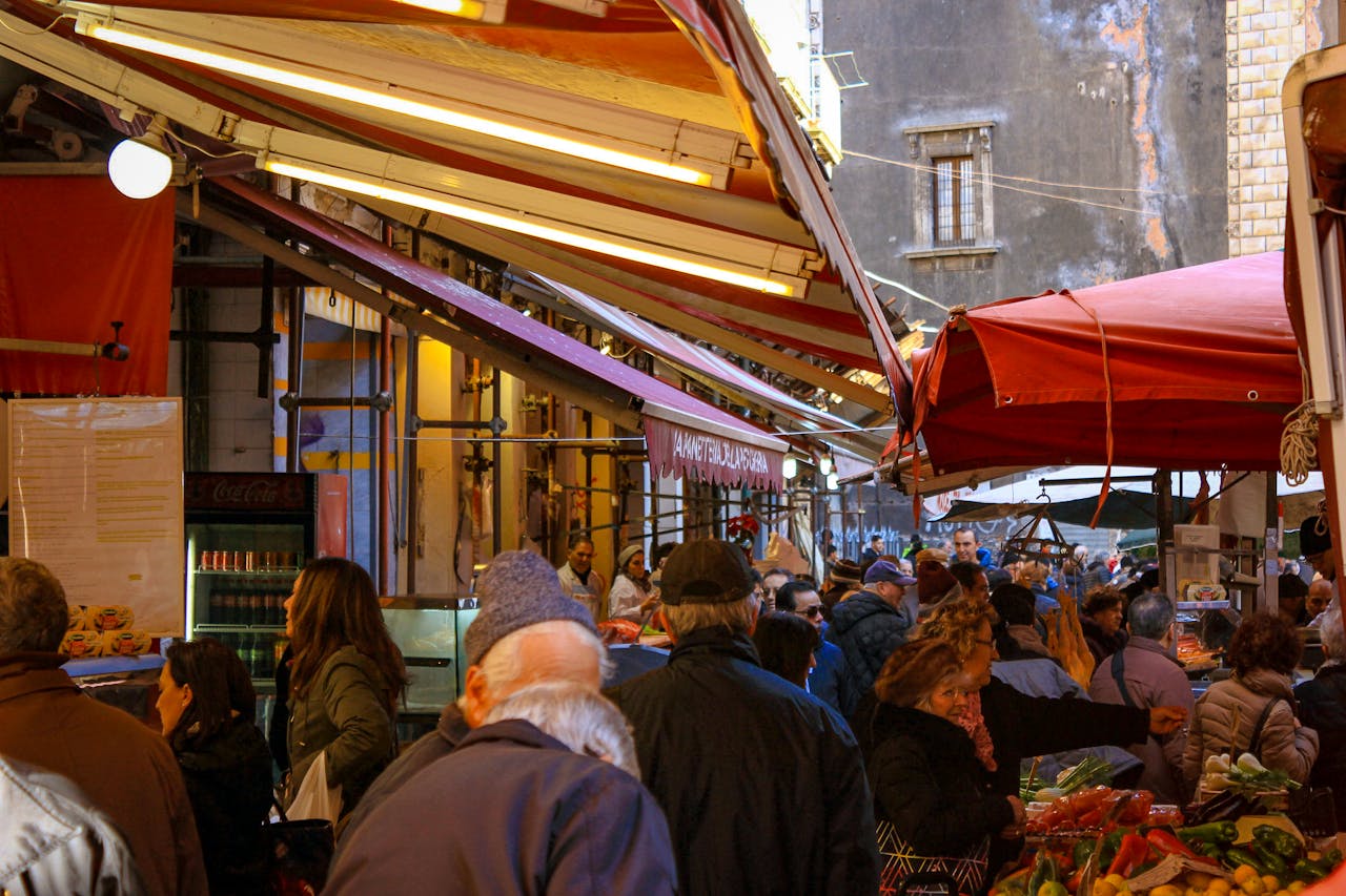 About Experience the bustling street market in Catania, Sicily, full of local flavor and culture.